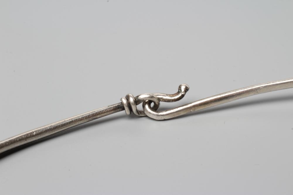 A GEORG JENSEN SILVER NECK RING designed by Viviana Torun Bulow-Hube Image