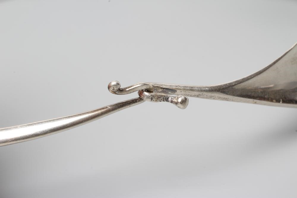 A GEORG JENSEN SILVER NECK RING designed by Viviana Torun Bulow-Hube Image