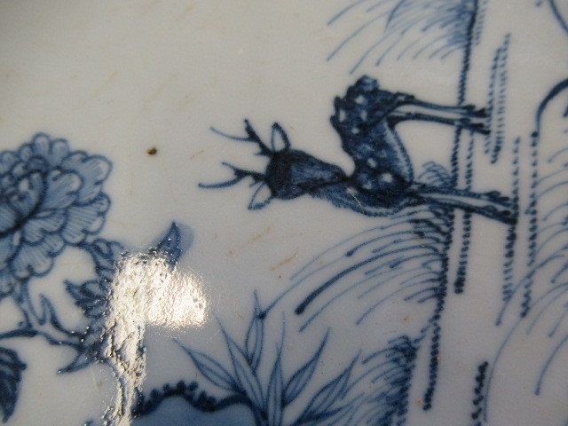 A CHINESE PORCELAIN CHARGER of octagonal form, painted in underglaze blue with a deer in open Image