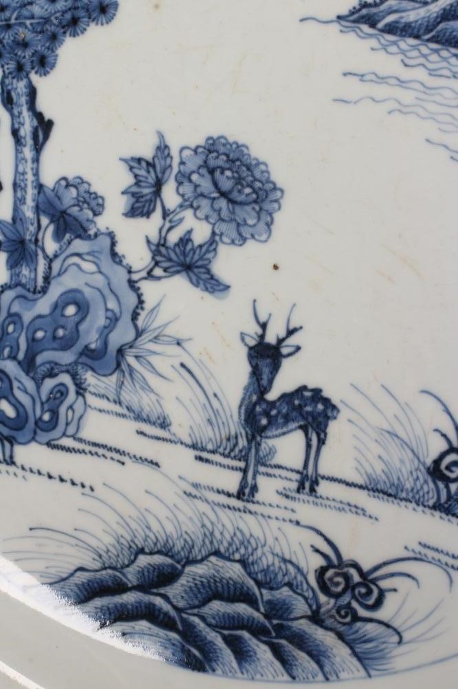 A CHINESE PORCELAIN CHARGER of octagonal form, painted in underglaze blue with a deer in open Image