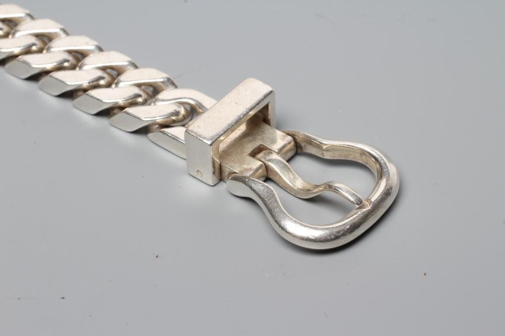 AN HERMES SILVER BRACELET, the flat curb links with buckle clasp, stamped HERMES, Ag 925 A*D Image