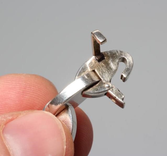 AN HERMES SILVER NECKLACE, the solid oval links with bar clasp, stamped HERMES, 925 and three other Image