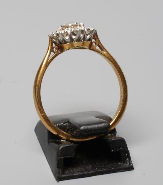 A DIAMOND CLUSTER RING Image