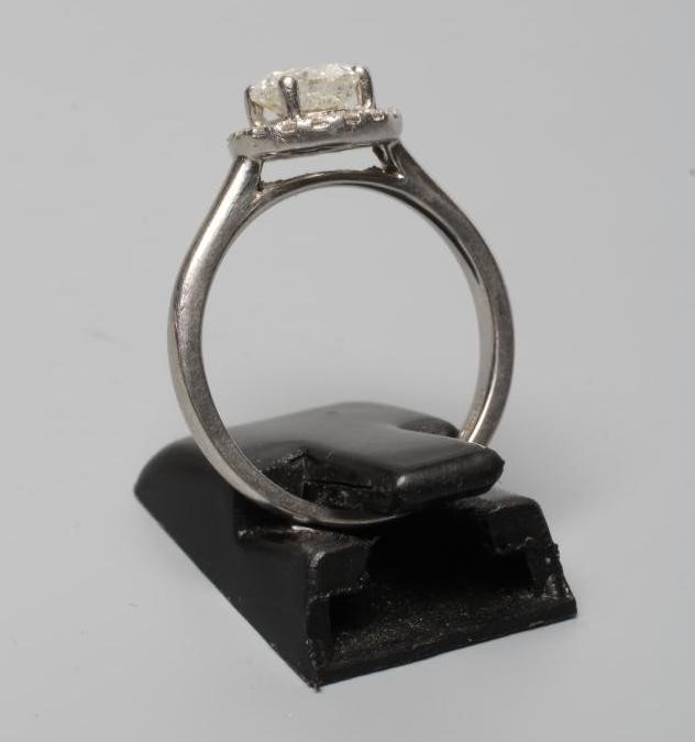 A DIAMOND CLUSTER RING Image