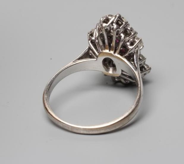 A MODERNIST RUBY AND DIAMOND RING Image