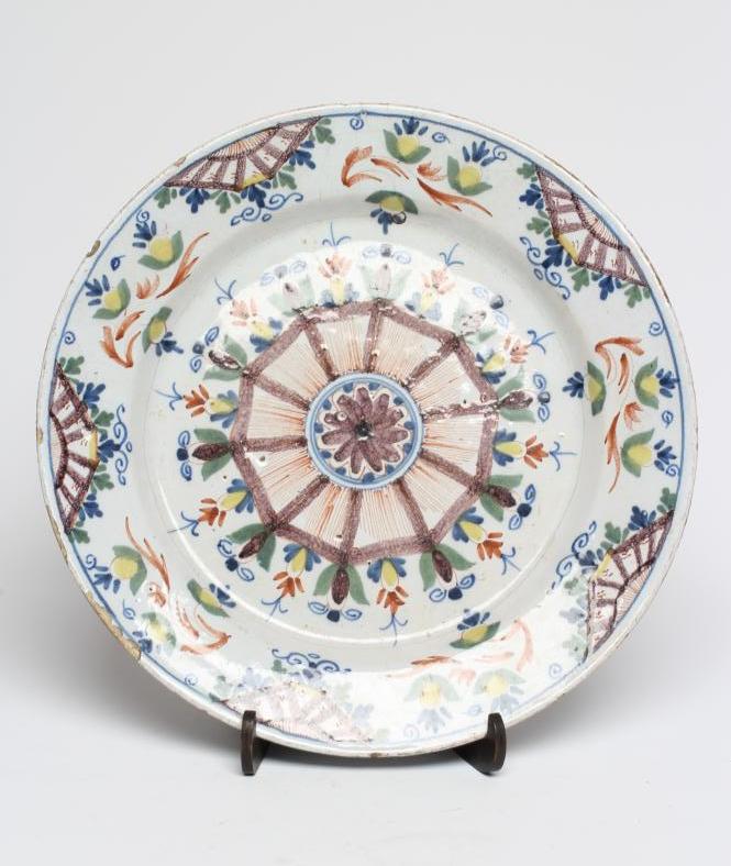 A LONDON DELFT 'ANN GOMM' STYLE CHARGER Image