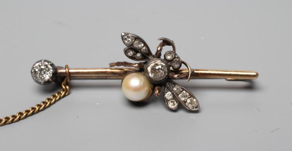 A VICTORIAN DIAMOND BEE BROOCH with pearl abdomen Image