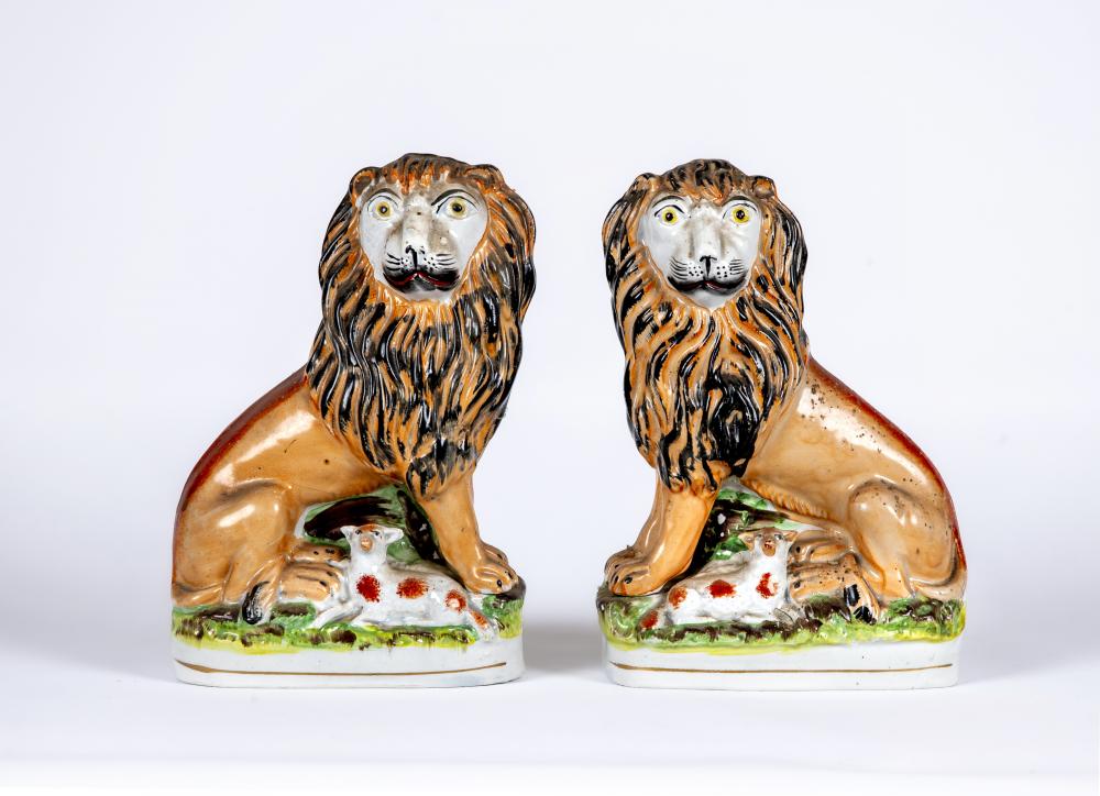 A PAIR OF VICTORIAN STAFFORDSHIRE POTTERY VAN AMBURGH LION AND LAMB FLATBACK MODELS, well moulded Image