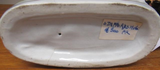 A PAIR OF VICTORIAN STAFFORDSHIRE POTTERY VAN AMBURGH LION AND LAMB FLATBACK MODELS, well moulded Image