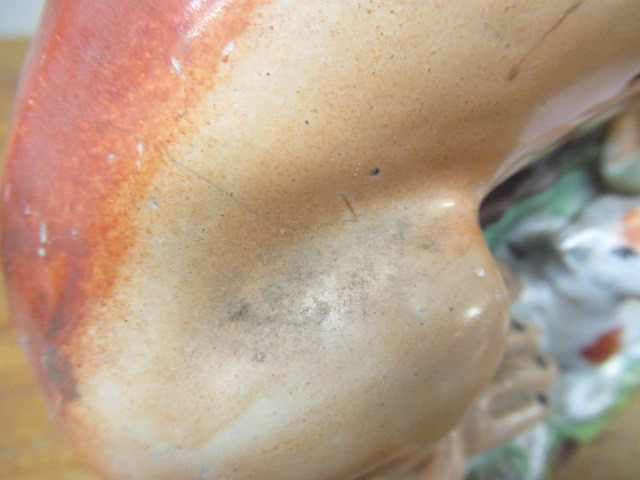 A PAIR OF VICTORIAN STAFFORDSHIRE POTTERY VAN AMBURGH LION AND LAMB FLATBACK MODELS, well moulded Image