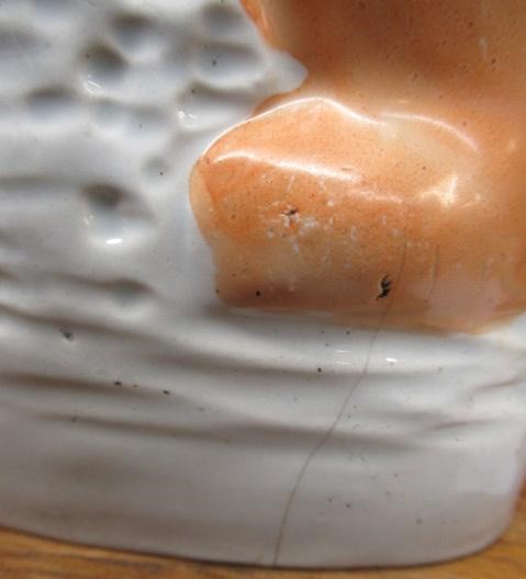 A PAIR OF VICTORIAN STAFFORDSHIRE POTTERY VAN AMBURGH LION AND LAMB FLATBACK MODELS, well moulded Image