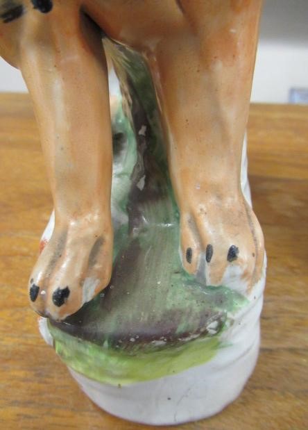 A PAIR OF VICTORIAN STAFFORDSHIRE POTTERY VAN AMBURGH LION AND LAMB FLATBACK MODELS, well moulded Image