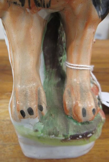 A PAIR OF VICTORIAN STAFFORDSHIRE POTTERY VAN AMBURGH LION AND LAMB FLATBACK MODELS, well moulded Image