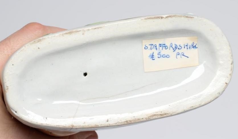 A PAIR OF VICTORIAN STAFFORDSHIRE POTTERY VAN AMBURGH LION AND LAMB FLATBACK MODELS, well moulded Image