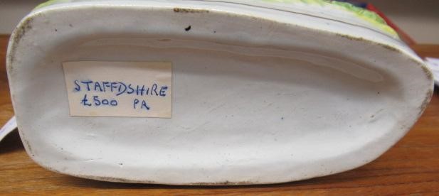 A PAIR OF VICTORIAN STAFFORDSHIRE POTTERY VAN AMBURGH LION AND LAMB FLATBACK MODELS, well moulded Image