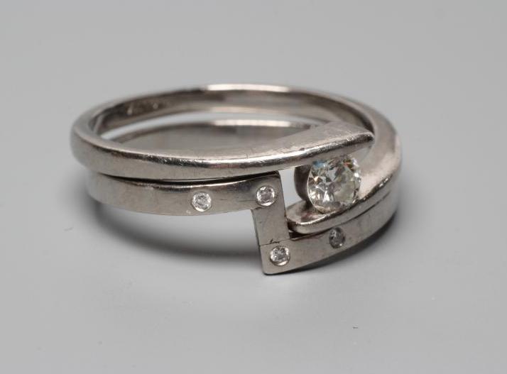 A PALLADIUM DIAMOND ENGAGEMENT AND MATCHING WEDDING RING Image