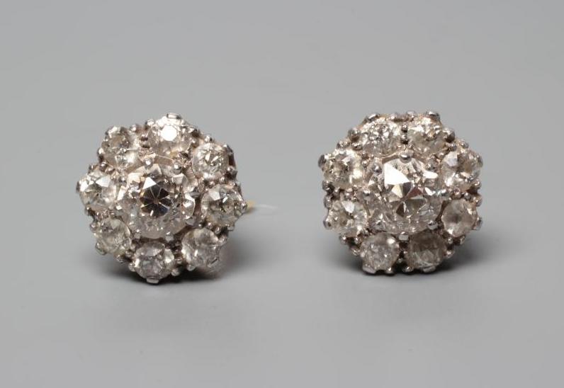 A PAIR OF DIAMOND CLUSTER EAR STUDS Image