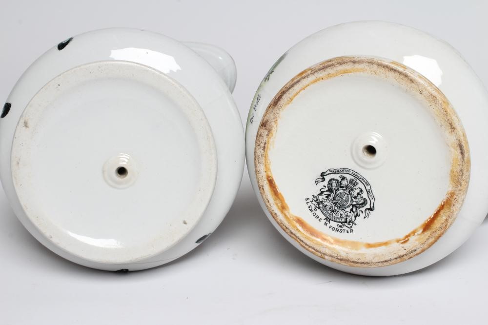 A PAIR OF VICTORIAN ELSMORE & FORSTER IRONSTONE PUZZLE JUGS of baluster form Image