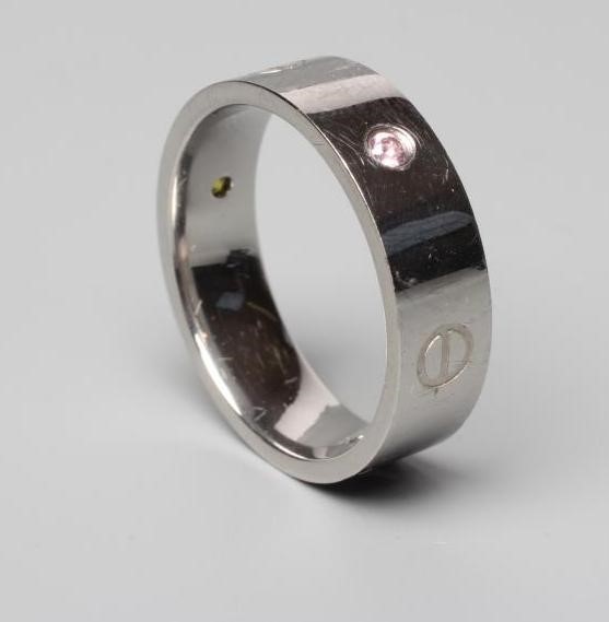 A CARTIER 18CT WHITE GOLD 'LOVE' RING Image