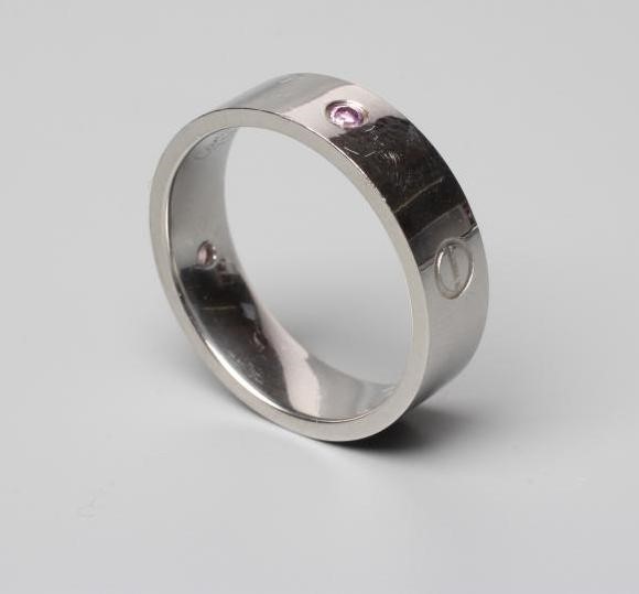 A CARTIER 18CT WHITE GOLD 'LOVE' RING Image
