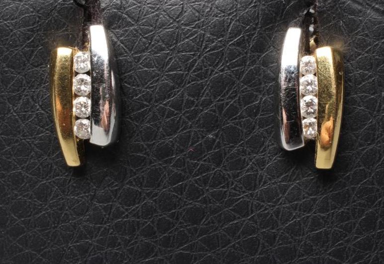 A PAIR OF BI-COLOURED 18CT GOLD AND DIAMOND EAR STUDS Image