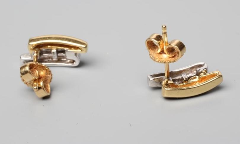A PAIR OF BI-COLOURED 18CT GOLD AND DIAMOND EAR STUDS Image
