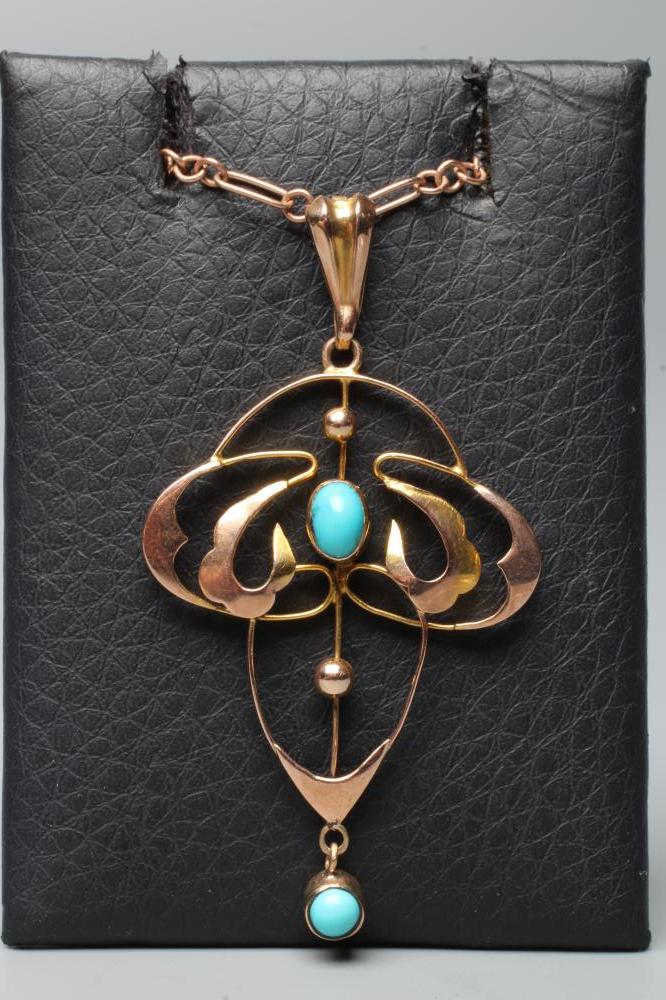 AN EDWARDIAN ARTS AND CRAFTS PENDANT of quatrefoil form Image
