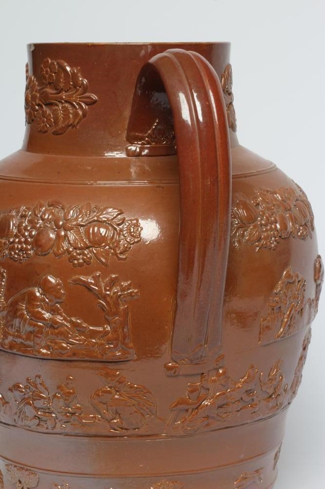 A LARGE SALTGLAZE STONEWARE HARVEST JUG Image