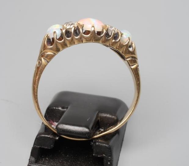 A LATE VICTORIAN OPAL AND DIAMOND RING Image