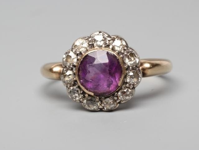 A LATE VICTORIAN AMETHYST AND DIAMOND CLUSTER RING Image