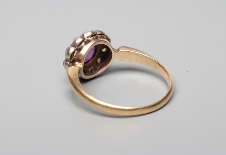 A LATE VICTORIAN AMETHYST AND DIAMOND CLUSTER RING Image