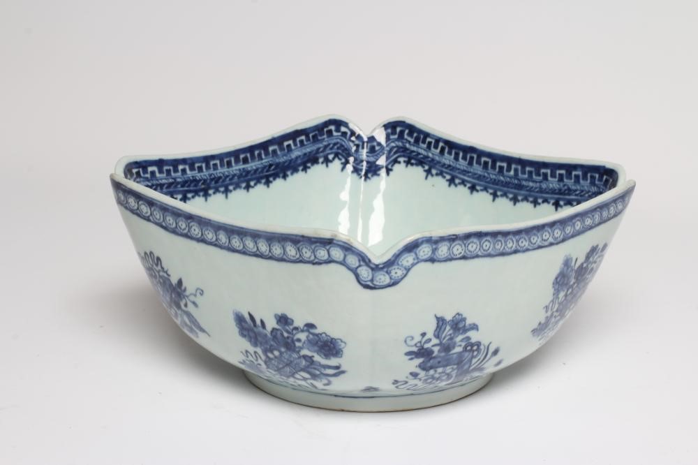 A CHINESE PORCELAIN BOWL of lobed square form painted in underglaze blue with precious objects below Image