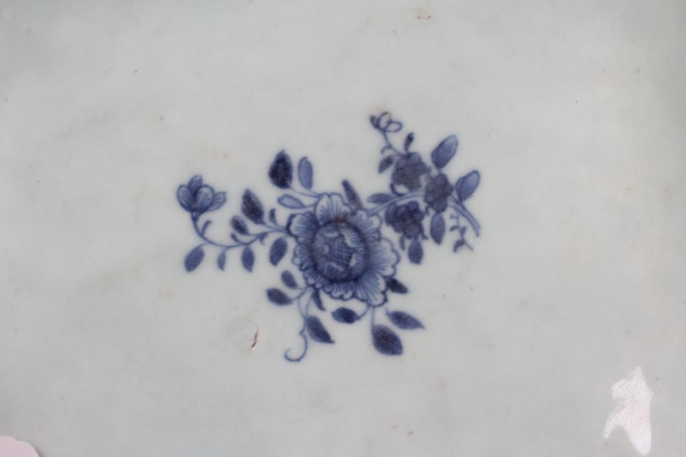 A CHINESE PORCELAIN BOWL of lobed square form painted in underglaze blue with precious objects below Image