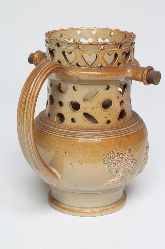 A CHESTERFIELD (BRAMPTON?) SALTGLAZE STONEWARE PUZZLE JUG Image