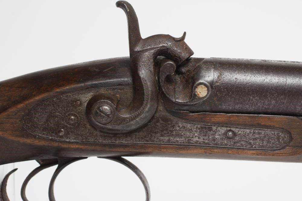 A PERCUSSION DOUBLE BARRELLED SHOTGUN Image