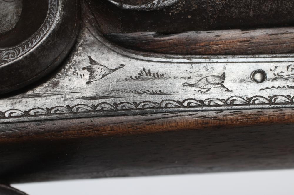 A PERCUSSION DOUBLE BARRELLED SHOTGUN Image