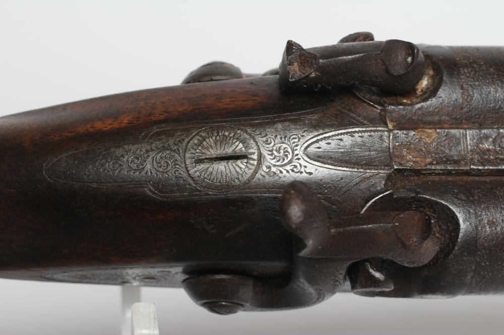 A PERCUSSION DOUBLE BARRELLED SHOTGUN Image