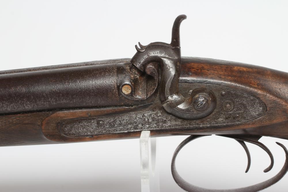 A PERCUSSION DOUBLE BARRELLED SHOTGUN Image