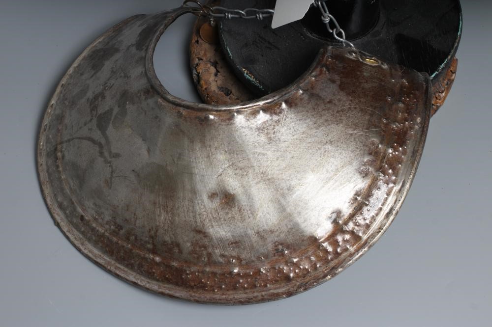 A REPRODUCTION BURGONET HELMET with high medial ridge, rounded peak, neck and ear guards, together Image