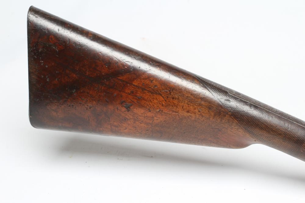 A PERCUSSION DOUBLE BARRELLED SHOTGUN Image