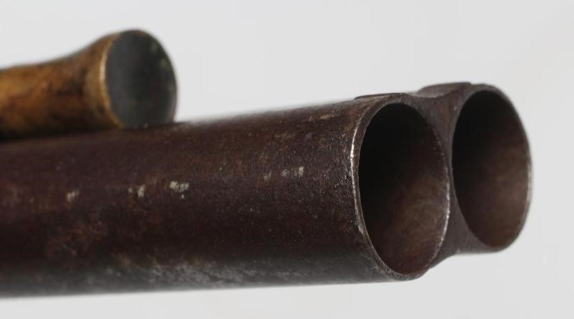 A PERCUSSION DOUBLE BARRELLED SHOTGUN Image