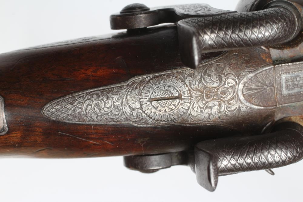 A PERCUSSION DOUBLE BARRELLED SHOTGUN Image