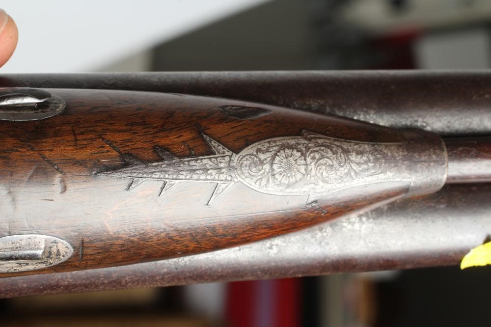 A PERCUSSION DOUBLE BARRELLED SHOTGUN Image