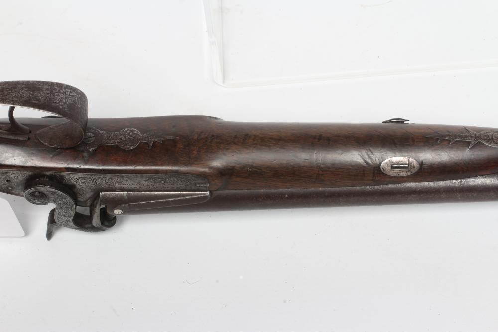 A PERCUSSION DOUBLE BARRELLED SHOTGUN Image