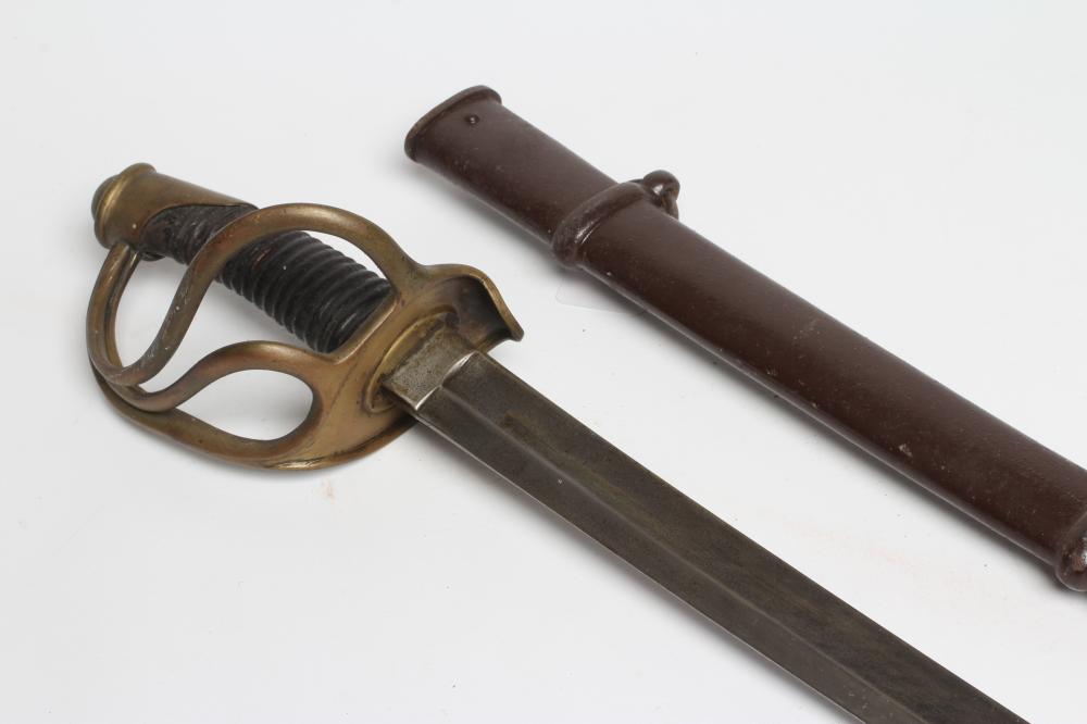 A FRENCH CAVALRY SABRE, possible US civil war import, with 35 1/2" curved and fullered blade, brass Image