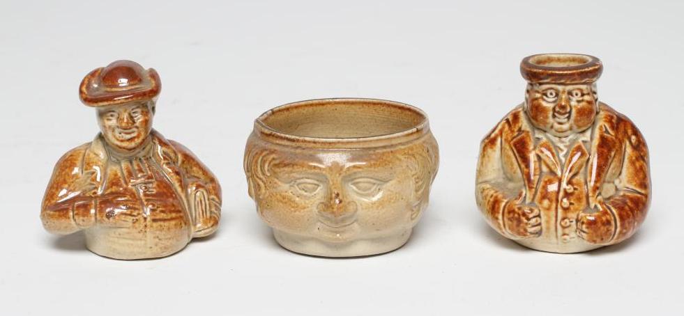 A VICTORIAN STONEWARE NOVELTY INKWELL modelled as Mr Pickwick with a quill hole to each shoulder Image