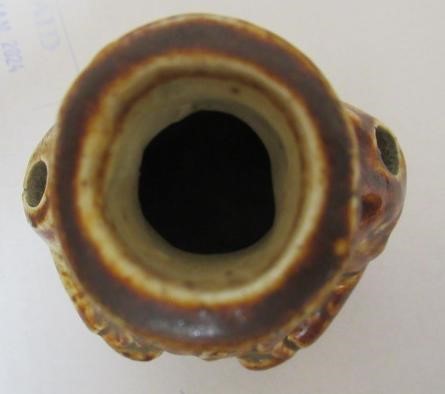 A VICTORIAN STONEWARE NOVELTY INKWELL modelled as Mr Pickwick with a quill hole to each shoulder Image