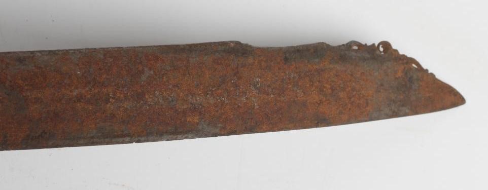 A DAYAK HEAD-HUNTER'S SWORD, the 21" blade shaped and decorated at the tip, carved bone handle, Image