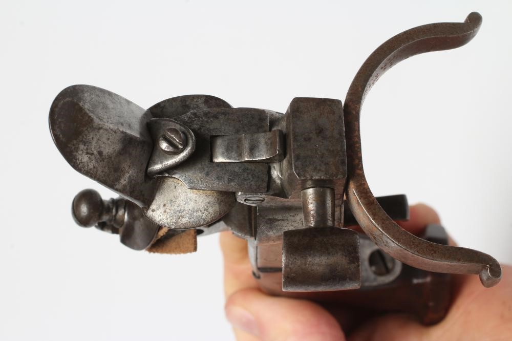 A FLINTLOCK TINDER BOX PISTOL, 19th century, with large pan, box lock action and walnut grip, 5 3/4" Image
