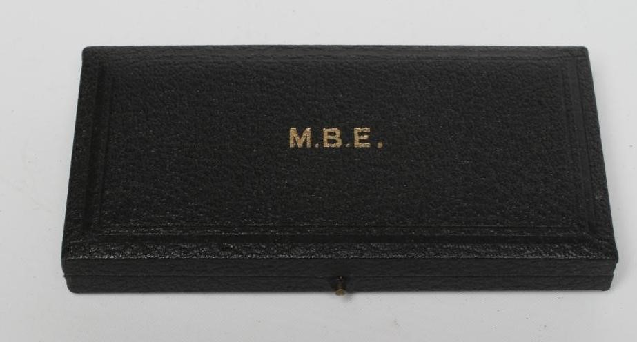A GEORGE VI M.B.E. with red ribbon, boxed, un-named (Est. plus 24% premium inc. VAT) Image